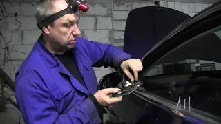 How to dismantle the mirror element of a Tesla Model 3 electric car. Disassembly and repair.