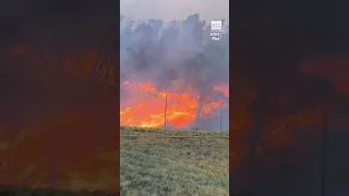 Firefighters continue to battle raging wildfires