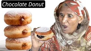 Tribal People Try Chocolate Filled Donut For The First Time