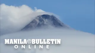 Clouds form a ring at Mayon's crater