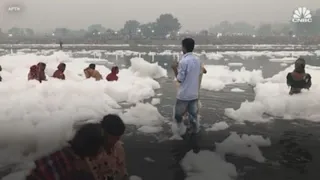 India's extreme air pollution causes toxic foam on Yamuna river