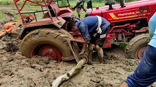 How to get tractor out of mud/This tractor stuck for 4 hours/tractor mud rescue/will come out or not