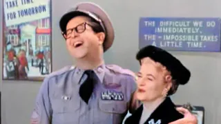 Sgt. Ernie Bilko flirting with Colonel Hall's wife.