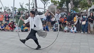 Taiwan Giant metal hoop acrobatics .