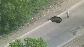 Deputies shut down Dallas County road after 30-foot deep sinkhole emerges