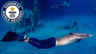 Longest distance swam underwater holding breath - Guinness World Records