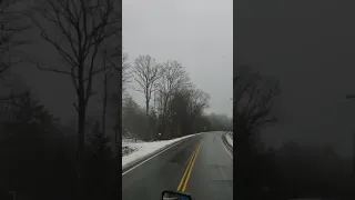 Winding, wet road from New Hampshire to Vermont.