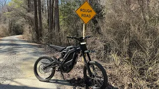 Riding the E Ride Pro SS all out on a gravel forest service road