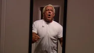 A masked man is stalking Ric Flair: Raw, May 26, 2003