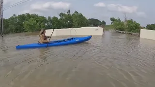 Homeowner using kayak to get in and out of North Texas neighborhood after flooding