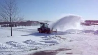 John Deere 3720 blowing snow