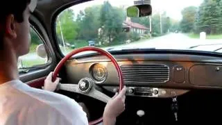 1957 Volkswagen Beetle on a country road