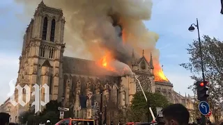 Notre Dame fire: Firefighters battle blaze as night falls in Paris
