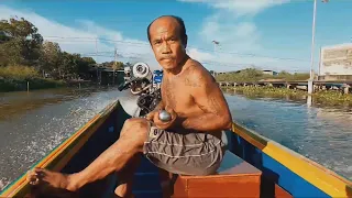Uncle driving a Thai long-tail Boat Diesel Turbo Engine Top Speed recorded at 120 kph (75 mph)