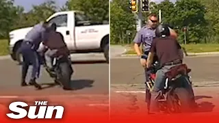 Motorcyclist pushes Massachusetts trooper into oncoming traffic while fleeing stop
