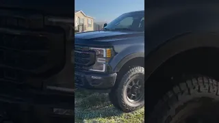 The ol’ winch gets to pull a tractor out of the mud.