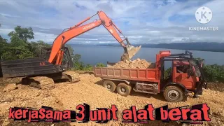 Hitachi zaxis200 5G excavator loading material in a dump truck