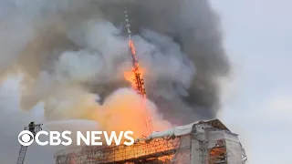 Copenhagen's historic Old Stock Exchange erupts in flames, collapsing legendary spire