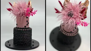 Modern Cake with dried Flower and Feather