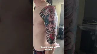 Kitsune mask and Sakura.