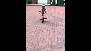 3 year old doing stunts on bike