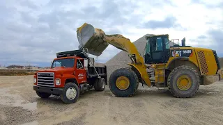 Dump Truck Tailgating Gravel on a Long Driveway