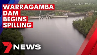 Warragamba Dam has begun spilling says the NSW State Emergency Service | 7NEWS