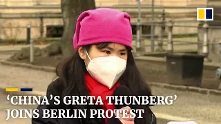 'The Greta Thunberg of China', Howey Ou, joins protest in Berlin