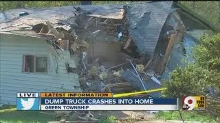 Garbage truck slams into Green Township home