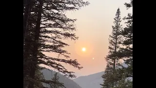 Hiking alone to Prairie mountain in the evening. Alberta, Canada.