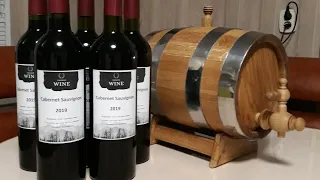 Homemade wine in an oak barrel. DIY home winemaking. Aging wine in barrels at home