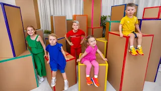 Kids games HIDE AND SEEK in cardboard boxes