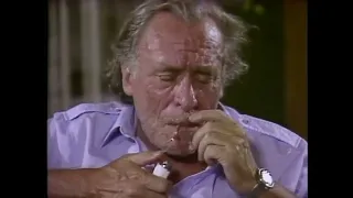 Charles Bukowski gets upset and kicks his young girlfriend for going out late.