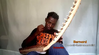 Playing a solo on adungu (Bow harp)