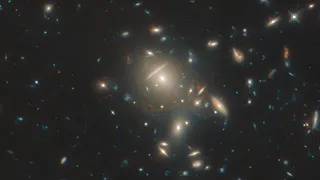 Hubble Captures Far-Off Starburst Galaxy in Impeccable Detail