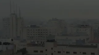 Smoke covers Gaza Strip after a night of explosions