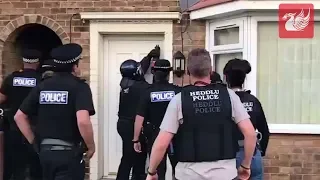 Police raid homes across Merseyside & North Wales