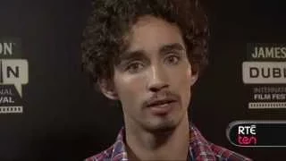 Robert Sheehan sings, reveals the best prank he's ever played & more.