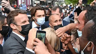 French President Macron slapped during trip to south, two people arrested