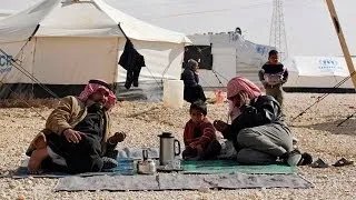 Syrians dream of returning home in 2014 at Jordan's Zaatari refugee camp
