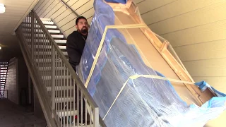 How to Move a Heavy Dresser Upstairs By a Professional Mover