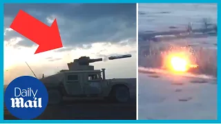 Ukrainian soldiers fire TOW missile to destroy Russian armoured vehicle