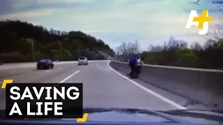 Cop Saves Man Trying To Jump Off A Bridge