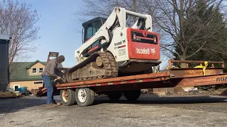 Removing shed with a bobcat