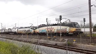 Tren mercancías químico internacional con cuatro locomotoras Renfe Mercancías S/252 por Cornellà.