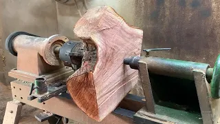 Excellent workmanship A talented carpenter with a wood lathe creates miracles from a Piece of Wood