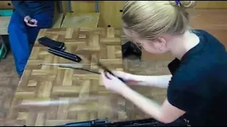 Russian girl disassembling Ak 47 in 20 seconds