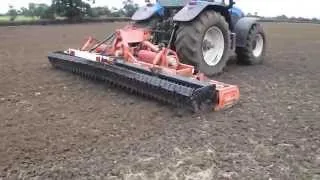 TM190 cultivating with power harrow