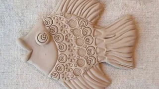 Modeling of fish from clay.