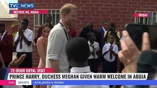 Prince Harry, Duchess Meghan Given Warm Welcome In Abuja